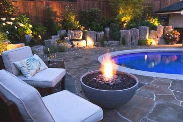 Hemi Firebowl Solus Decor Solus Hemi Firepit Near Circular Pool At Night