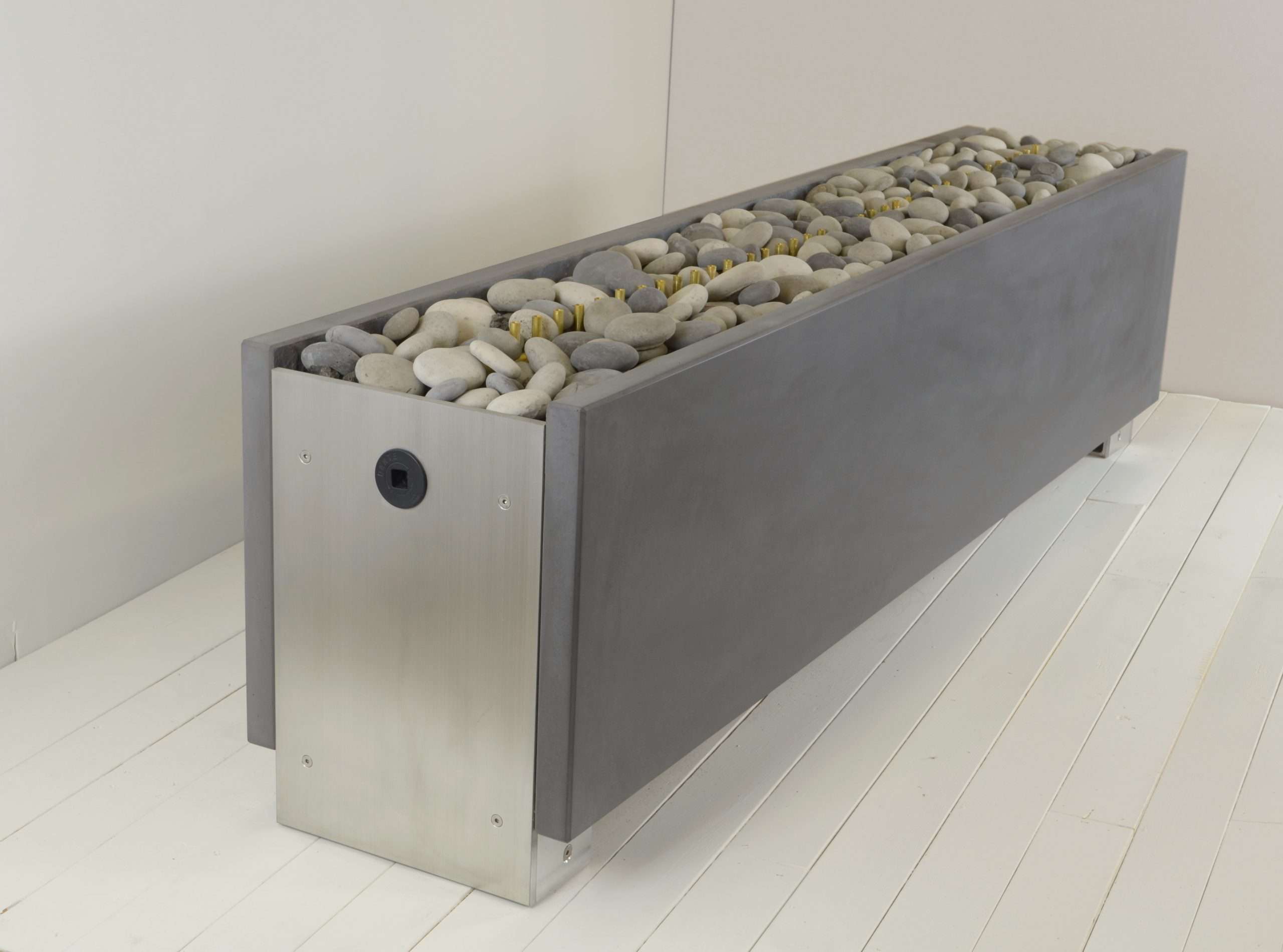 Linear Single Stack Gas Fire Pit in Cinder (shown with full bed of rocks)